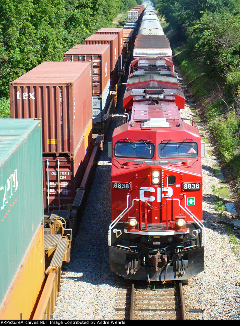 CP 8838 about to pass under Bobolink Rd. with Train 199 west